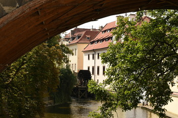 View of the Čertovka (Devil's Canal) and watermill near Charles bridge  in Prague 