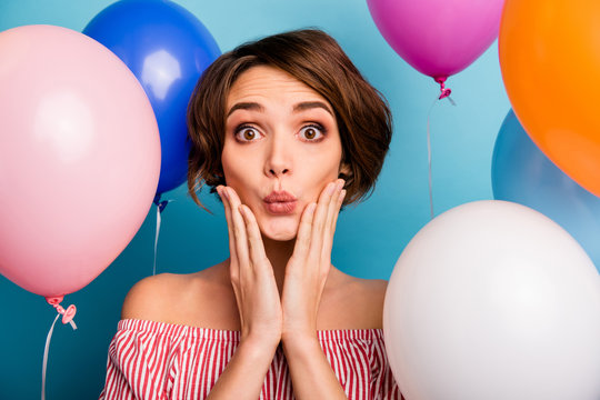 Close-up Portrait Of Nice Attractive Amazed Funny Cheerful Girlish Brown-haired Girl Having Fun Festal Day First Date Among Air Balls Isolated Over Bright Vivid Shine Vibrant Blue Color Background