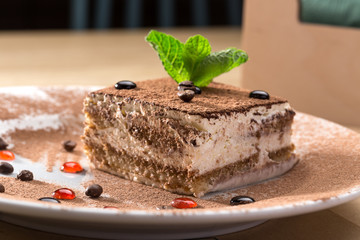 Tiramisu. Traditional italian dessert. Homemade tiramisu with coffee and cocoa