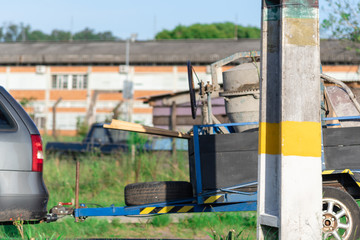 Naklejka premium A concrete mixer transported on a trailer