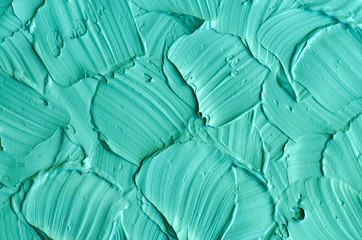 Light blue/green bentonite facial clay (mask, face cream, body wrap) texture close up, selective...