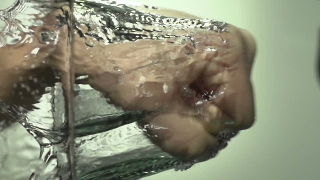 Punching the water with hand in Super Slow Motion