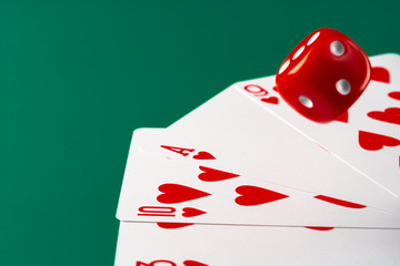Playing cards with red dice. Casino and gambling concept