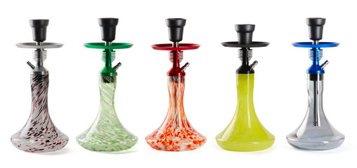 Set of five modern hookahs with black bowls, a metal top and flasks of glass in different colors,...