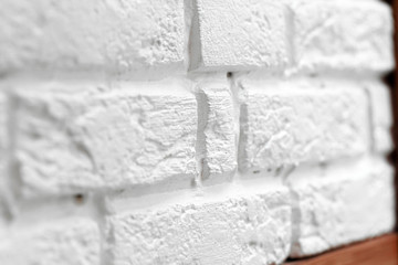 Textured white brick wall close up background
