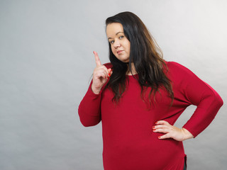 Woman say no by shaking finger