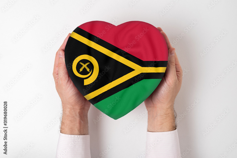 Wall mural flag of vanuatu on a heart shaped box in a male hands. white background