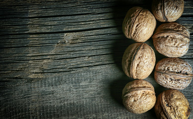 walnuts on a wooden background