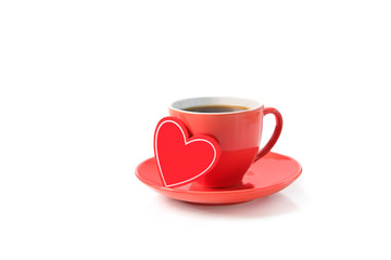 red cup with black coffee and heart on white background. Romantic minimal composition, Valentine's day concept. copy space