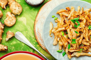 Fried Jerusalem artichoke on plate