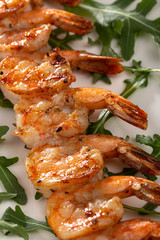 Grilled shrimp skewers. Seafood, shelfish. Shrimps with herbs, garlic and lemon. Barbecue srimps prawns.