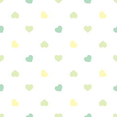 Seamless pattern in simple pastel green and yellow hearts on white background for fabric, textile, clothes, tablecloth and other things. Vector image.