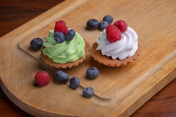 cake with cream and fresh berries