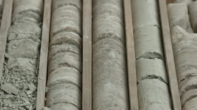 Geological borehole core samples stored in wooden box