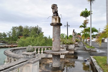 Abandoned park with broken seats and posts at Rota, Northern Mariana Islands.