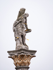 Column with statue of saint sebastian in burgenland