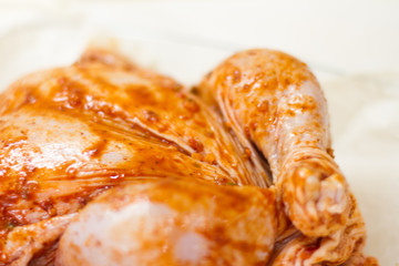 marinated chicken with seasonings. step-by-step recipe. baked meat in the oven. delicious and juicy white meat. dietary food.the view from the top. space for text.