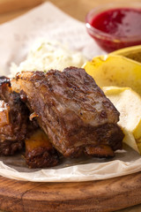  Grilled ribs. grilled and barbecue ribs pork. Juicy barbecue pork ribs beer.