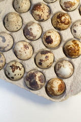 chicken eggs in a box on a white background. Easter. palm Sunday. healthy snack. protein. the concept of a farmer. space for text. the view from the top.