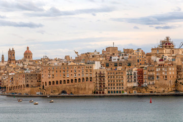 Fototapeta premium Grand Harbour of Malta, waterfront with St. Angelo Fort and Cabi Isla, Senglea at the background, Malta