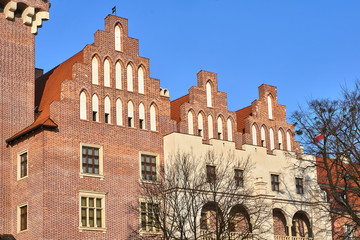 The historic brick building reconstructed royal castle in autumn in Poznan..