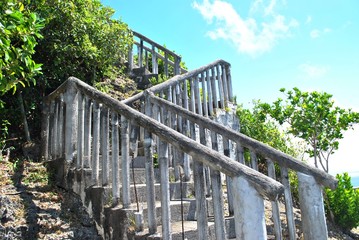 Fototapeta premium Concrete ladder installed otudoors to the Hidden Beach, Saipan.