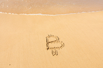 Image of icon bitcoin cryptocurrency on golden sand with sea water background. Concept freelance, stock exchange BTC sign hand written at sandy beach. Unstable rise and fall of concept, top view