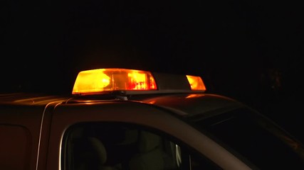 Recovery Breakdown van with flashing orange / amber light on top. Providing roadside assistance to broken down vehicles. Side Shot