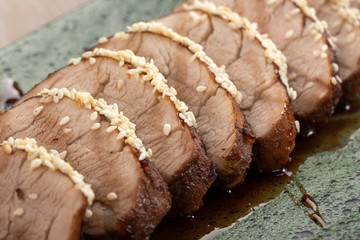 veal fillet with sauce. Baked veal. Close up of vitello tonnato italian dish. Thin sliced veal.