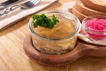 Traditional Russian meat aspic with mustard. Jellied meat. Jelly with meat, beef aspic, Ukrainian...