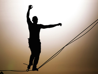 Slackliner balancing on highline