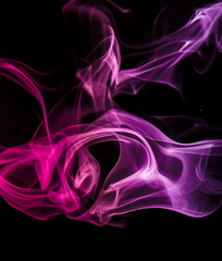 Colored smoke on black background