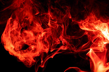 Red smoke on black background