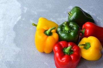Fresh uncooked bell pepper with multi-colored sweet peppers. Green, red and yellow vegetables....