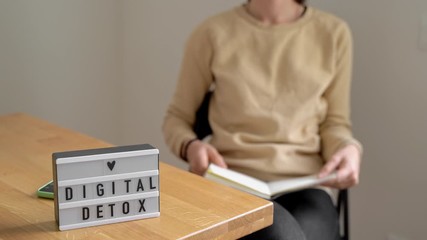 Digital detox day of young beautiful caucasian woman. Drinking coffee without phone. Addiction