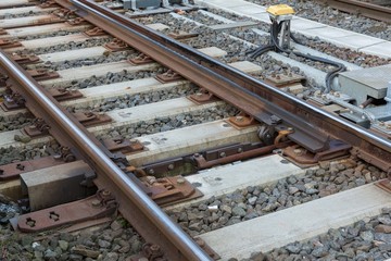 close up of railway junction on concrete sleeper