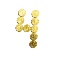 the figure of 4 laid out of bitcoin coins and isolated on white background