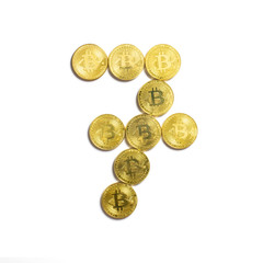the figure of 7 laid out of bitcoin coins and isolated on white background