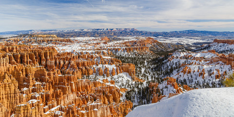Panoramic view of Bryce Canyon National Park in winter covered with snow seen from Inspiration Point