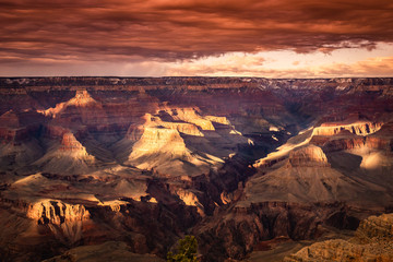 Dramatic sunset on the Grand Canyon during winter 