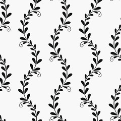 Vector seamless abstract pattern with black vertical branches and leaves on white background; floral abstract design for fabric, wallpaper, textile, web design.