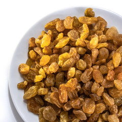 Raisins peeled on a white isolated background. Food grape yellow delicious for your design for the site. kitchen theme