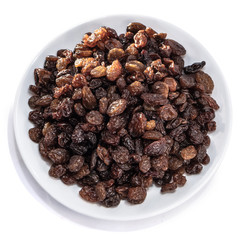 Raisins peeled on a white isolated background. Food grape  brown delicious for your design for the site. kitchen theme
