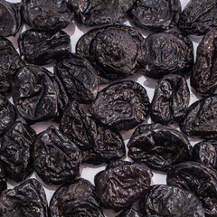 Prunes on a white isolated background. Food for your website design. kitchen theme cuisine and cooking
