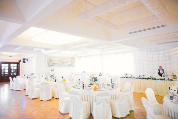 Interior of a restaurant prepared for wedding ceremony