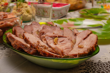 Braised boiled pork. Fried meat with garlic is cut into thin slices. Selective focus. Serving option.