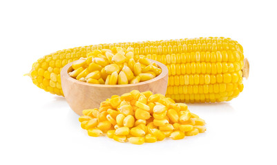 Corn seeds in wood bowl isolated on the white