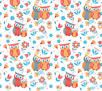 Seamless pattern with colorful owls on white background