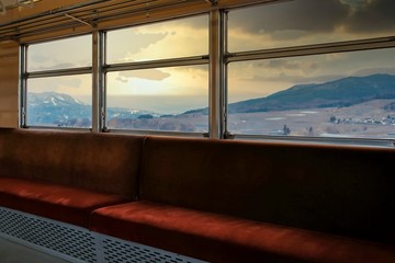 Fototapeta na wymiar 冬の雪景色 地方ローカル鉄道の車窓景色