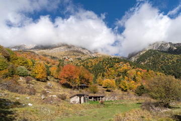 Obraz premium Fog revealing the Alpine mountain range, Ligurian Alps, Italy